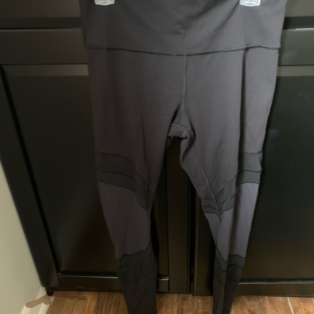 Lulu black seek the heat leggings with mesh detail size 12
